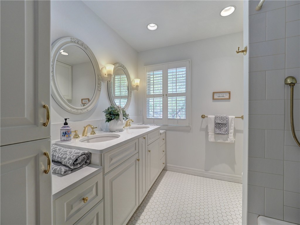 334 Pebble Beach Drive Portland, TX 78374 - Photo 40 of 40 a bathroom with a sink a toilet and mirror