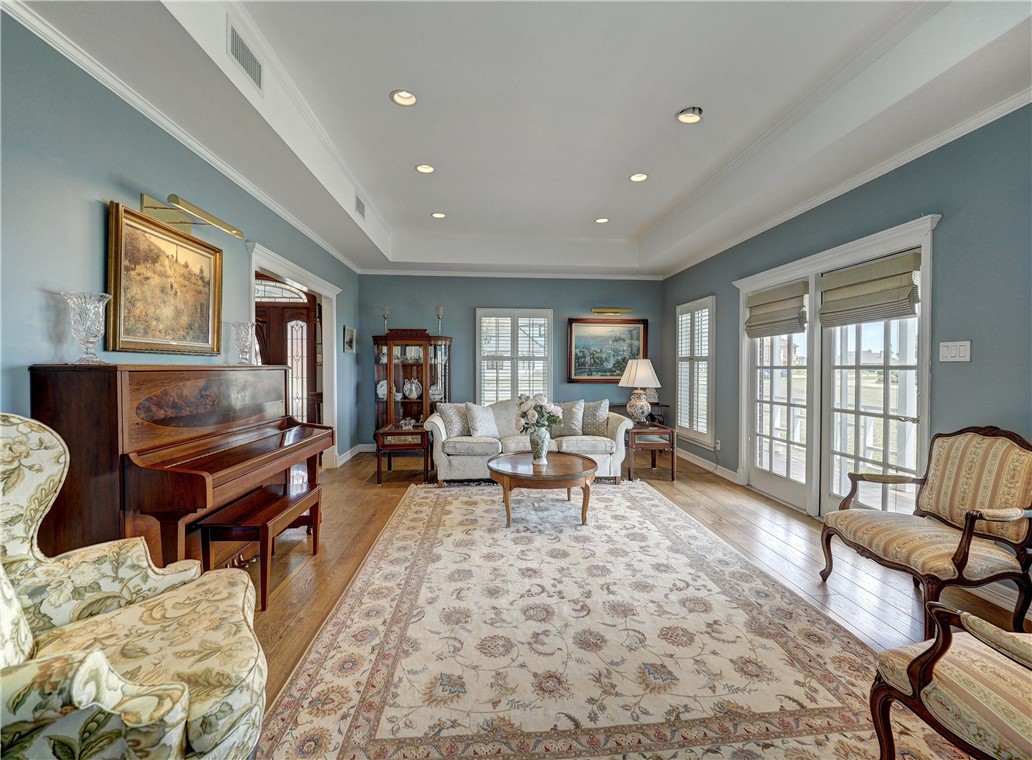 334 Pebble Beach Drive Portland, TX 78374 - Photo 6 of 40 a living room with furniture and a wooden floor