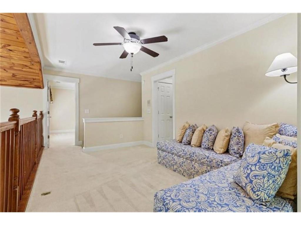 53 Pinto Place Jasper, GA 30143 - Photo 27 of 62 a bedroom with a bed and a chandelier