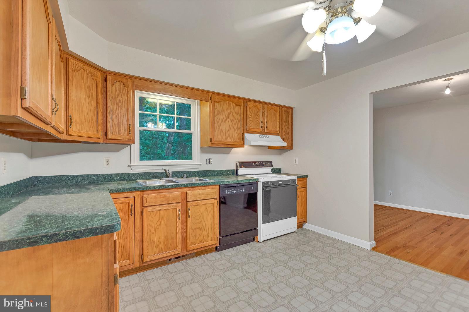 1010 Planters Wharf Road Lusby, MD 20657 - Photo 10 of 26 Kitchen view to dining rm **window overlooks back