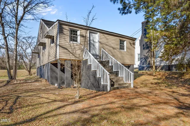 a view of a house with snow on the wall