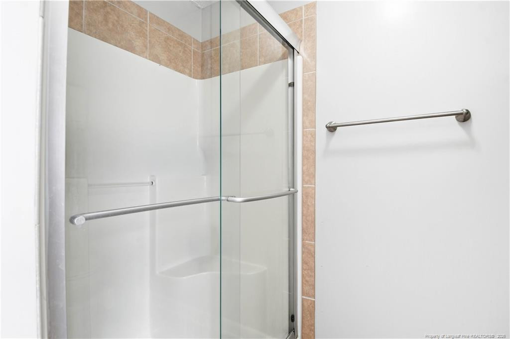 212 Lennox Loop Raeford, NC 28376 - Photo 31 of 47 a bathroom with a shower