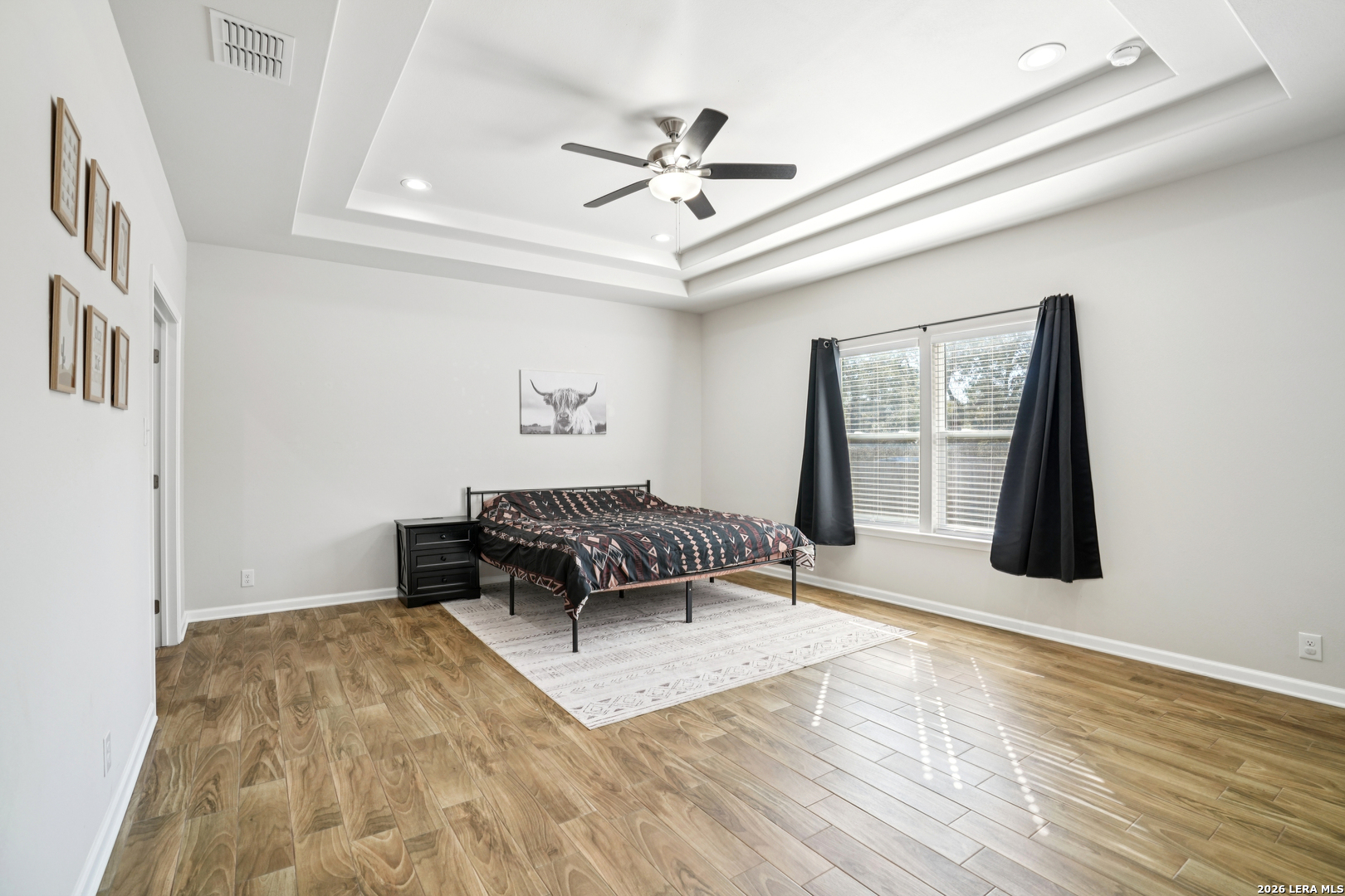 156 Remington Road Spring Branch, TX 78070 - Photo 13 of 32 a bedroom with a bed and a window