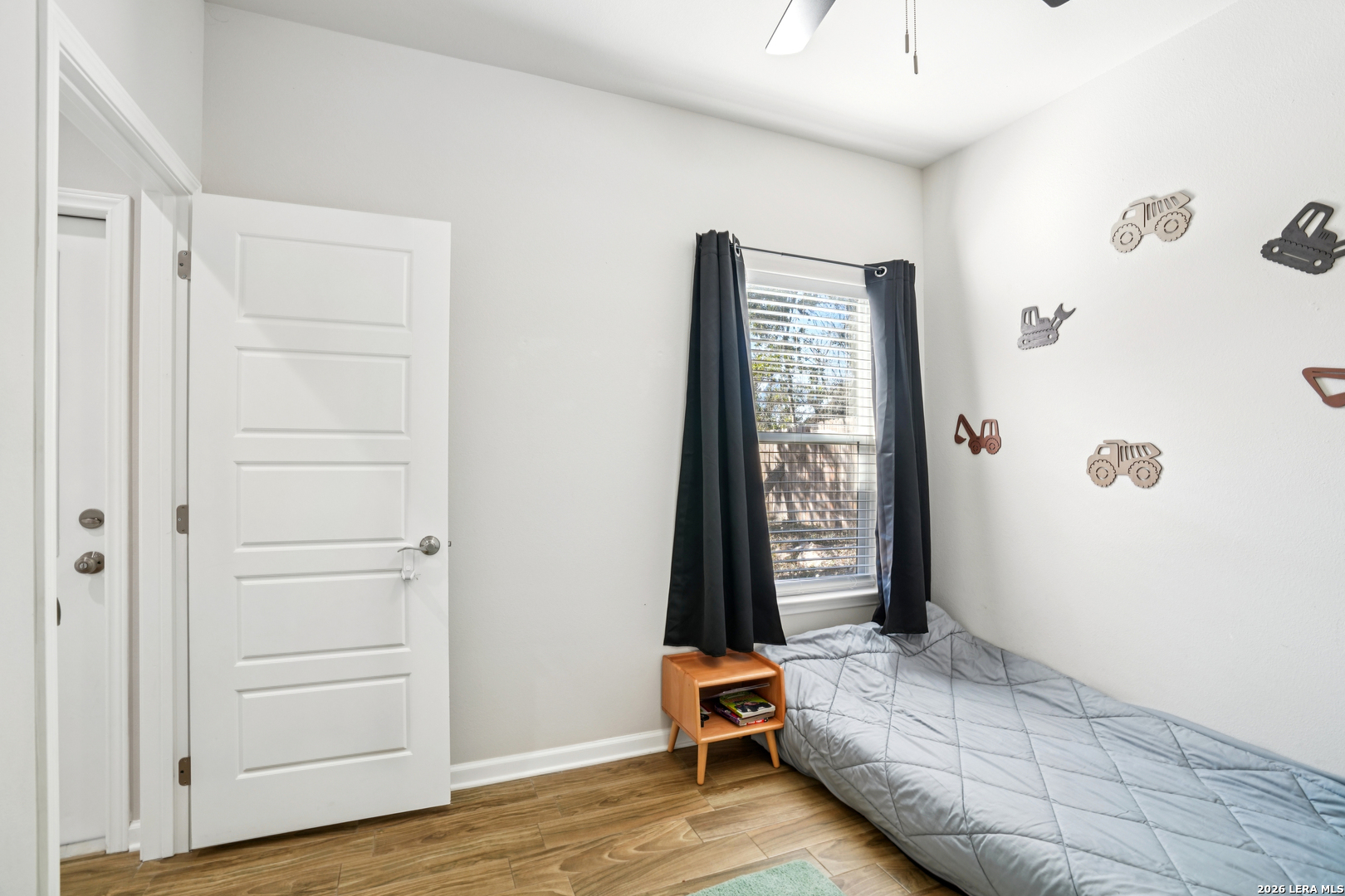 156 Remington Road Spring Branch, TX 78070 - Photo 22 of 32 a view of room with furniture and wooden floor