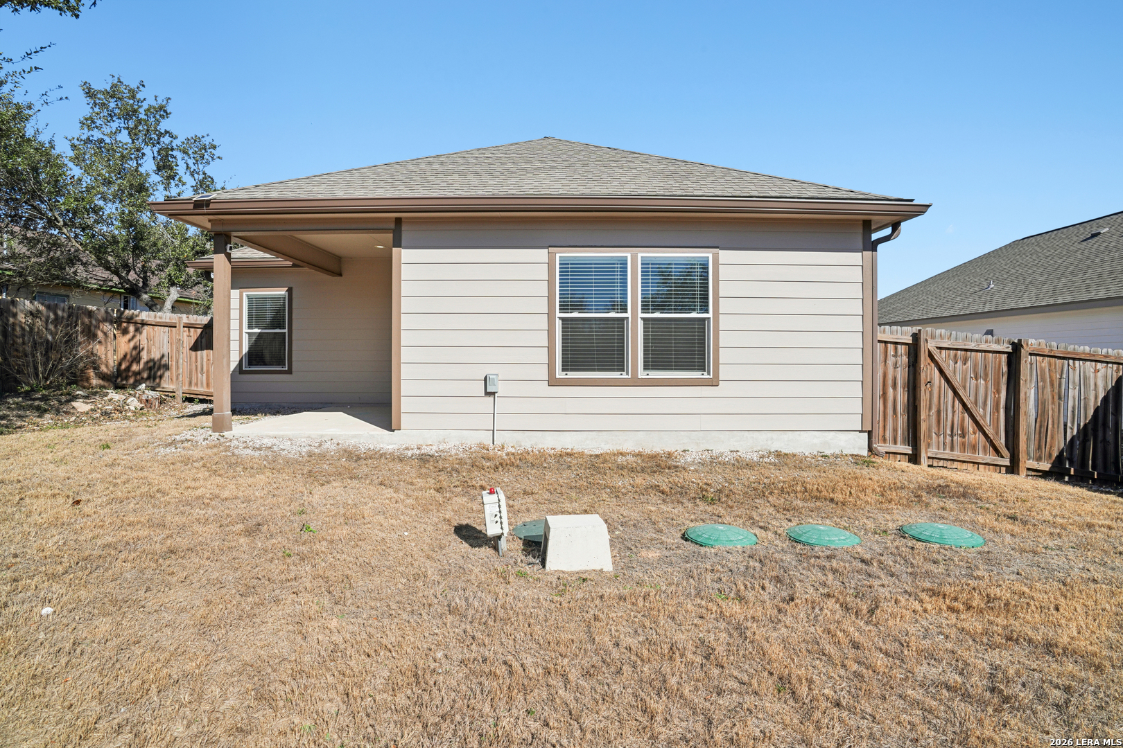 156 Remington Road Spring Branch, TX 78070 - Photo 29 of 32 a front view of a house with a yard