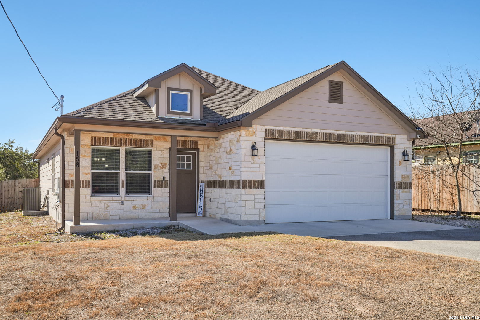 156 Remington Road Spring Branch, TX 78070 - Photo 4 of 32 front view of a house with a yard