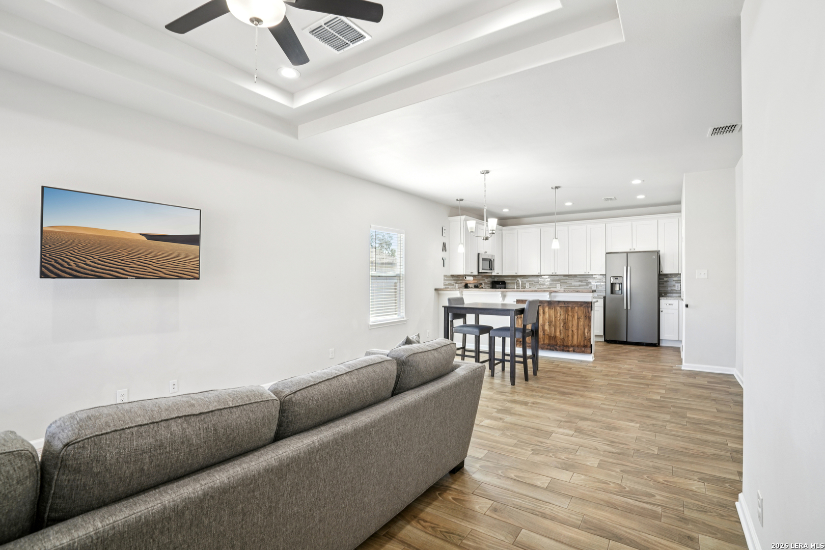 156 Remington Road Spring Branch, TX 78070 - Photo 6 of 32 a living room with stainless steel appliances furniture and a kitchen view