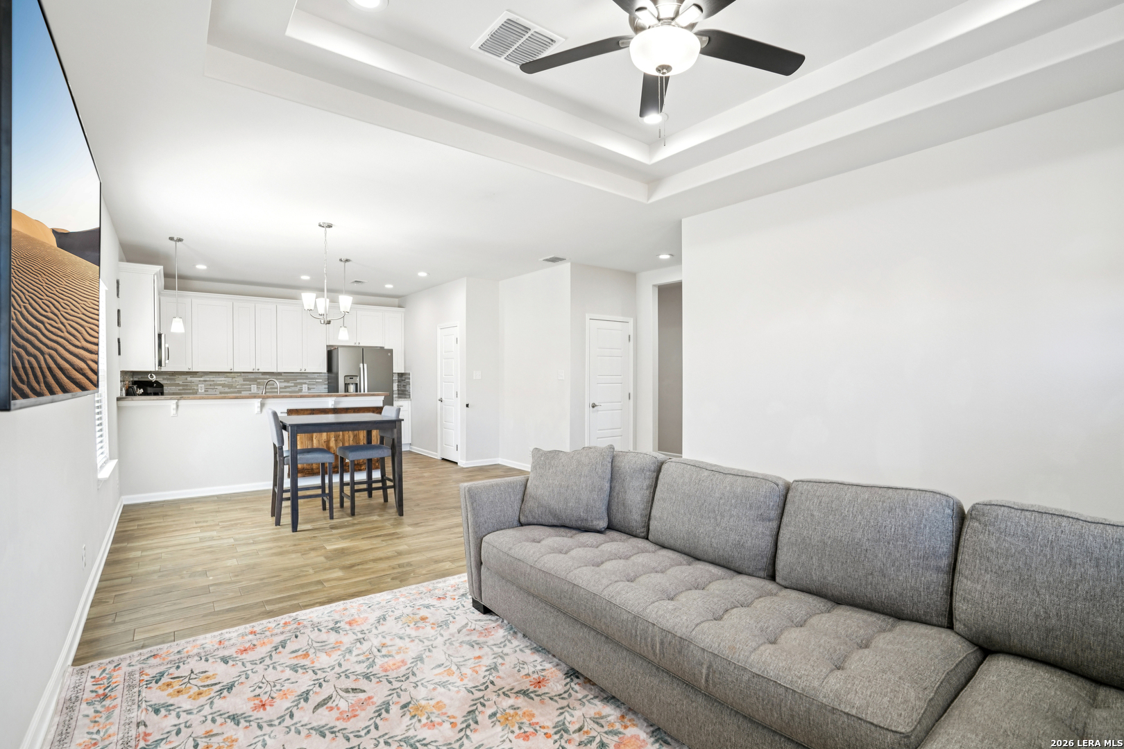156 Remington Road Spring Branch, TX 78070 - Photo 7 of 32 a living room with furniture and kitchen view