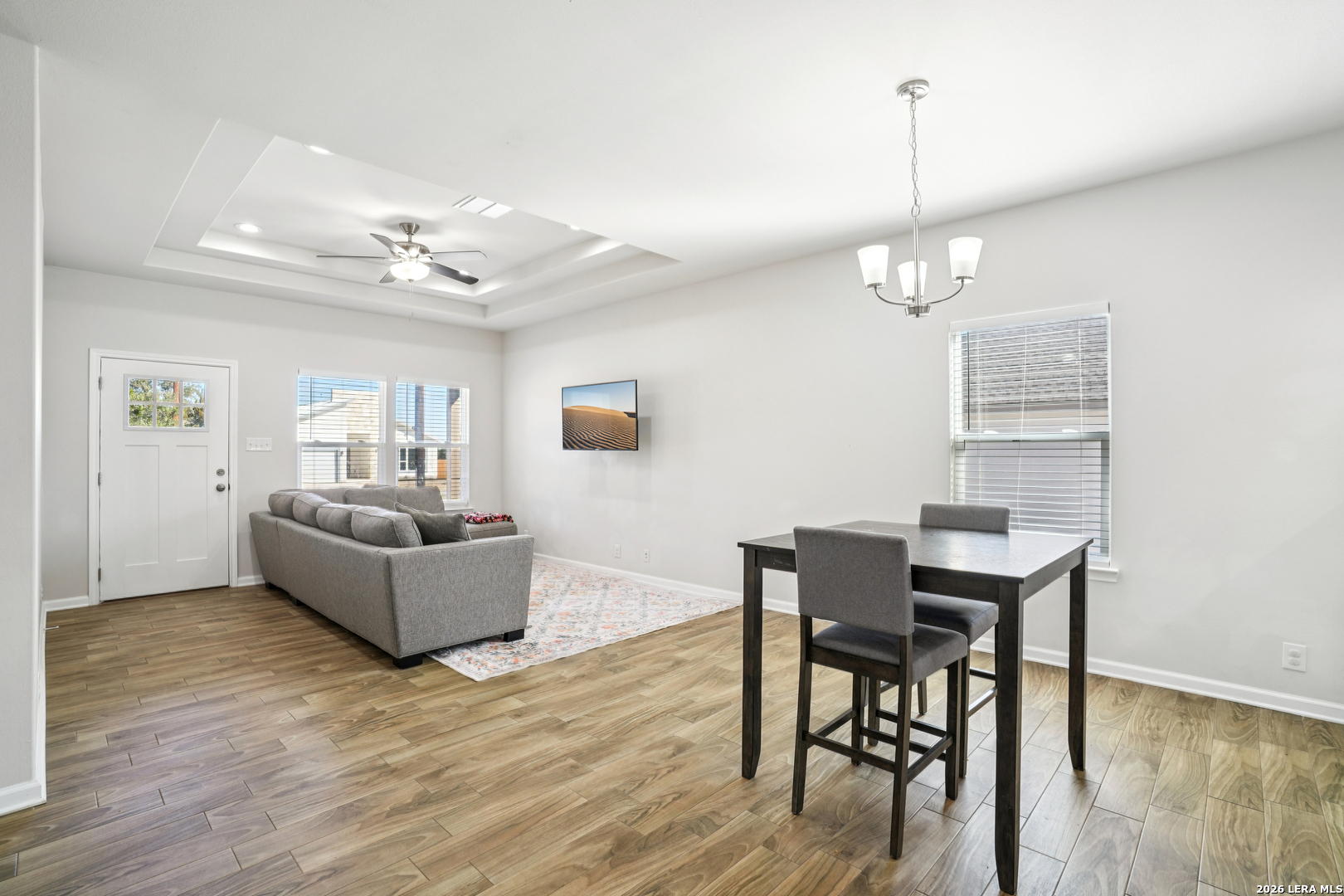156 Remington Road Spring Branch, TX 78070 - Photo 9 of 32 a living room with furniture and wooden floor