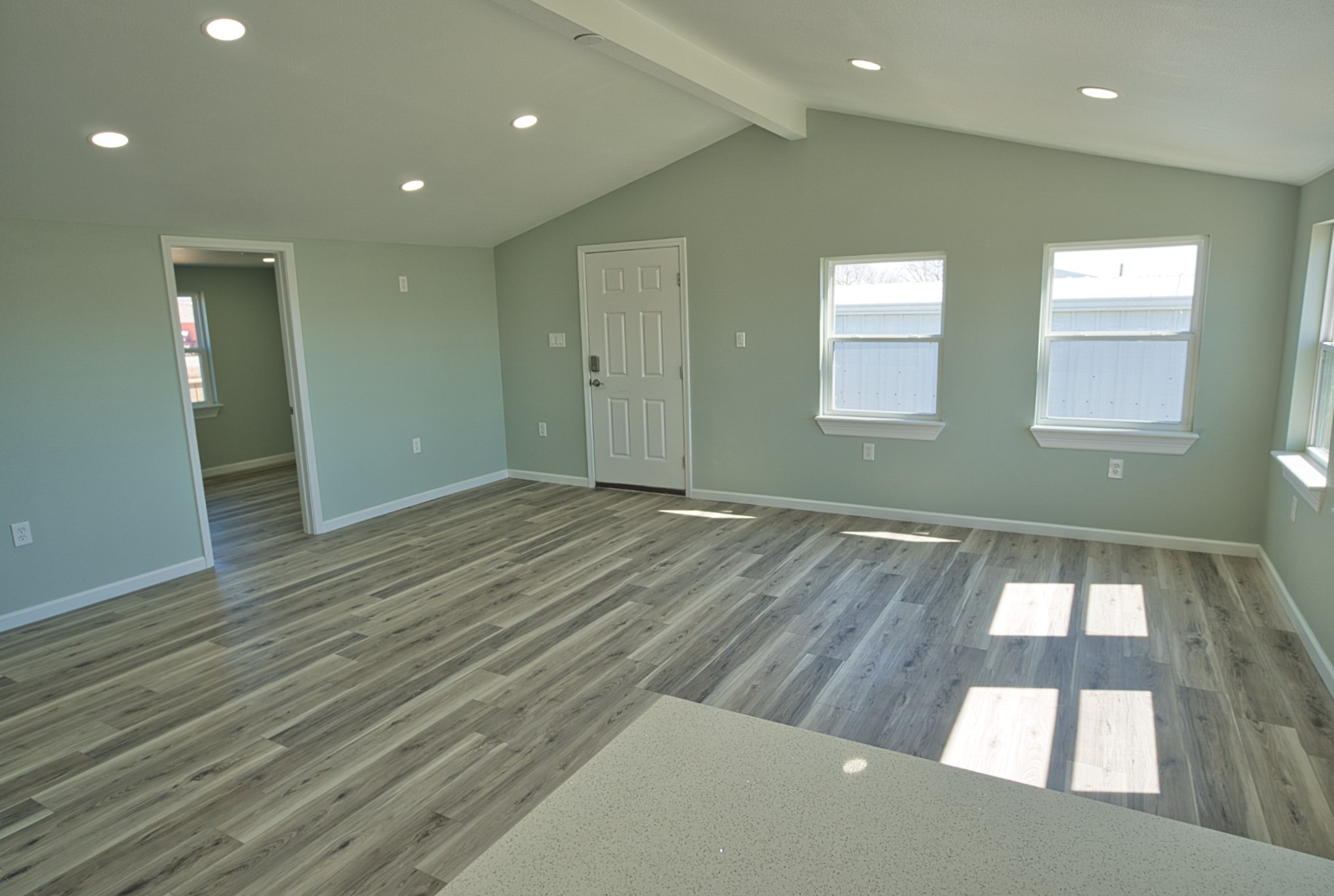 976 County Road 201 Sargent, TX 77414 - Photo 13 of 40 Living room from the kitchen showing the vaulted ceilings