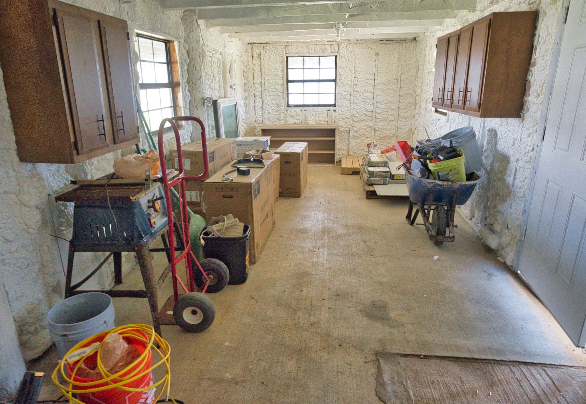 976 County Road 201 Sargent, TX 77414 - Photo 27 of 40 Downstairs ~300sf storage with half bath - Fully spray foam insulated!