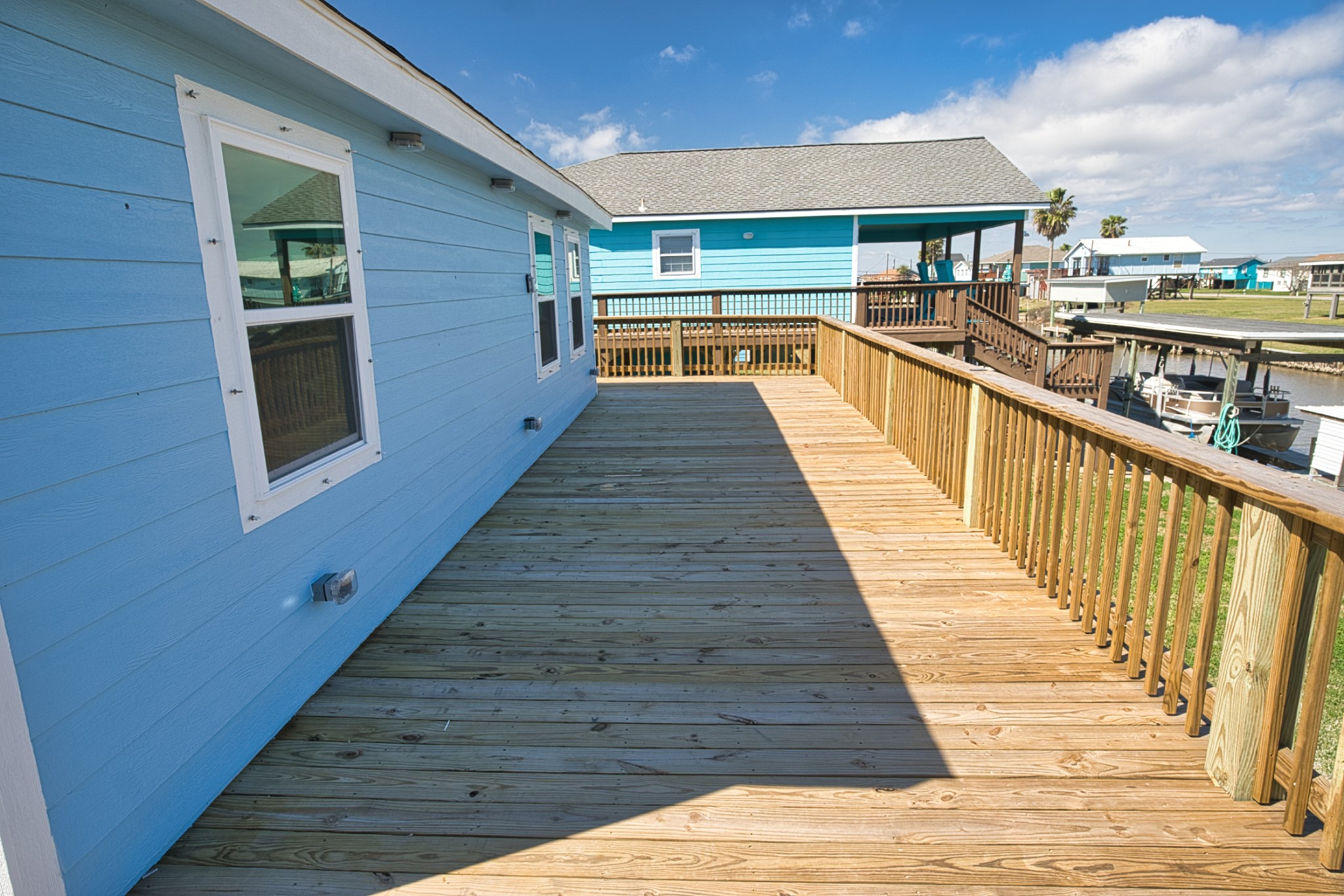 976 County Road 201 Sargent, TX 77414 - Photo 5 of 40 Large 12' deep deck for your relaxation!