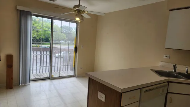 a room with a desk and a workspace