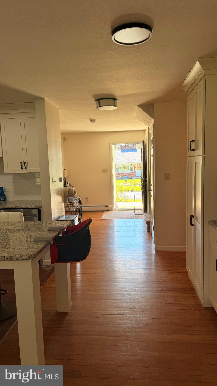 242 Spring Street State College, PA 16801 - Photo 10 of 73 Bright and inviting kitchen hallway.