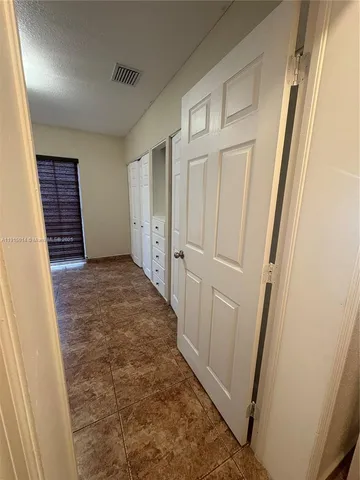 an empty room with a natural light