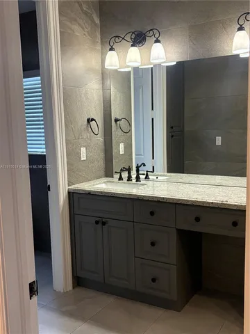 a front view of a house with a garage