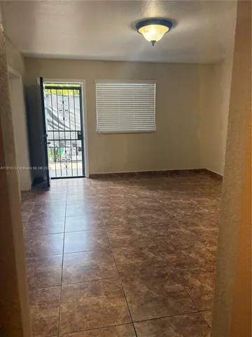 a view of a kitchen with a sink