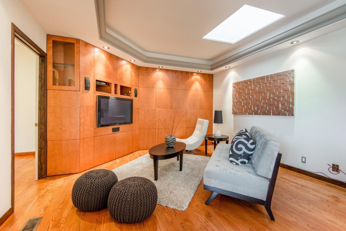 760 Darrell Road Hillsborough, CA 94010 - Photo 13 of 35 a bedroom with furniture and a bed