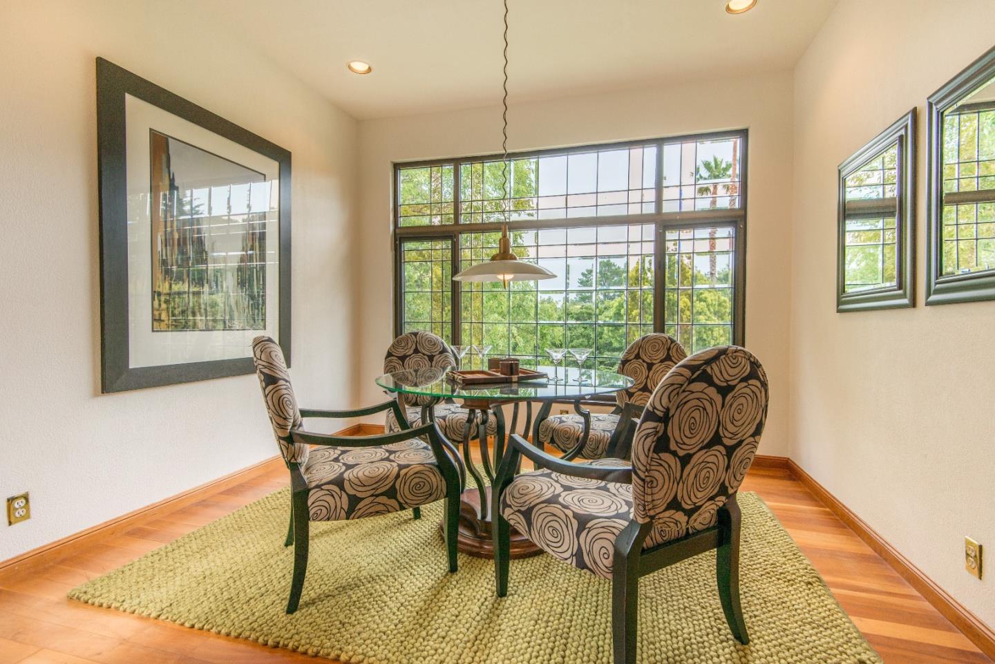 760 Darrell Road Hillsborough, CA 94010 - Photo 8 of 35 a dining room with furniture and windows
