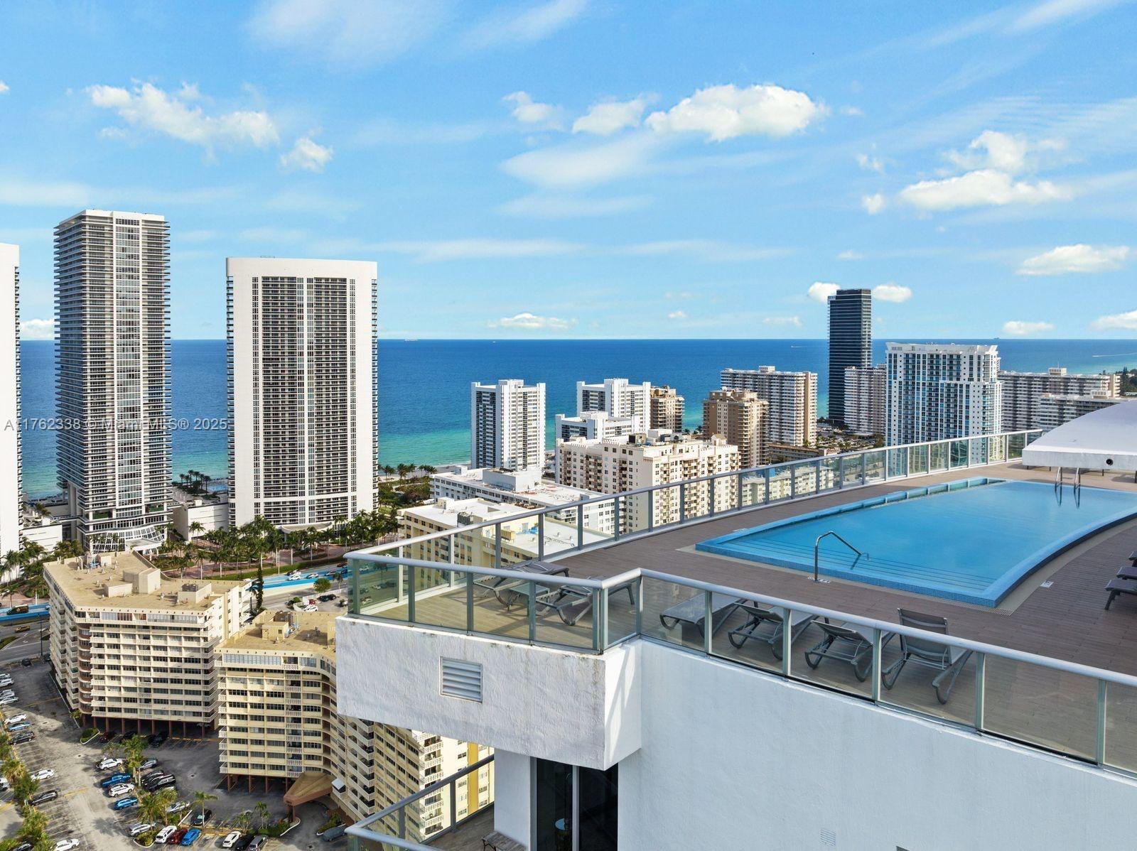 2602 East Hallandale Beach Boulevard, Unit R2703 Hallandale Beach, FL 33009 - Photo 29 of 50 a view of a balcony with chairs