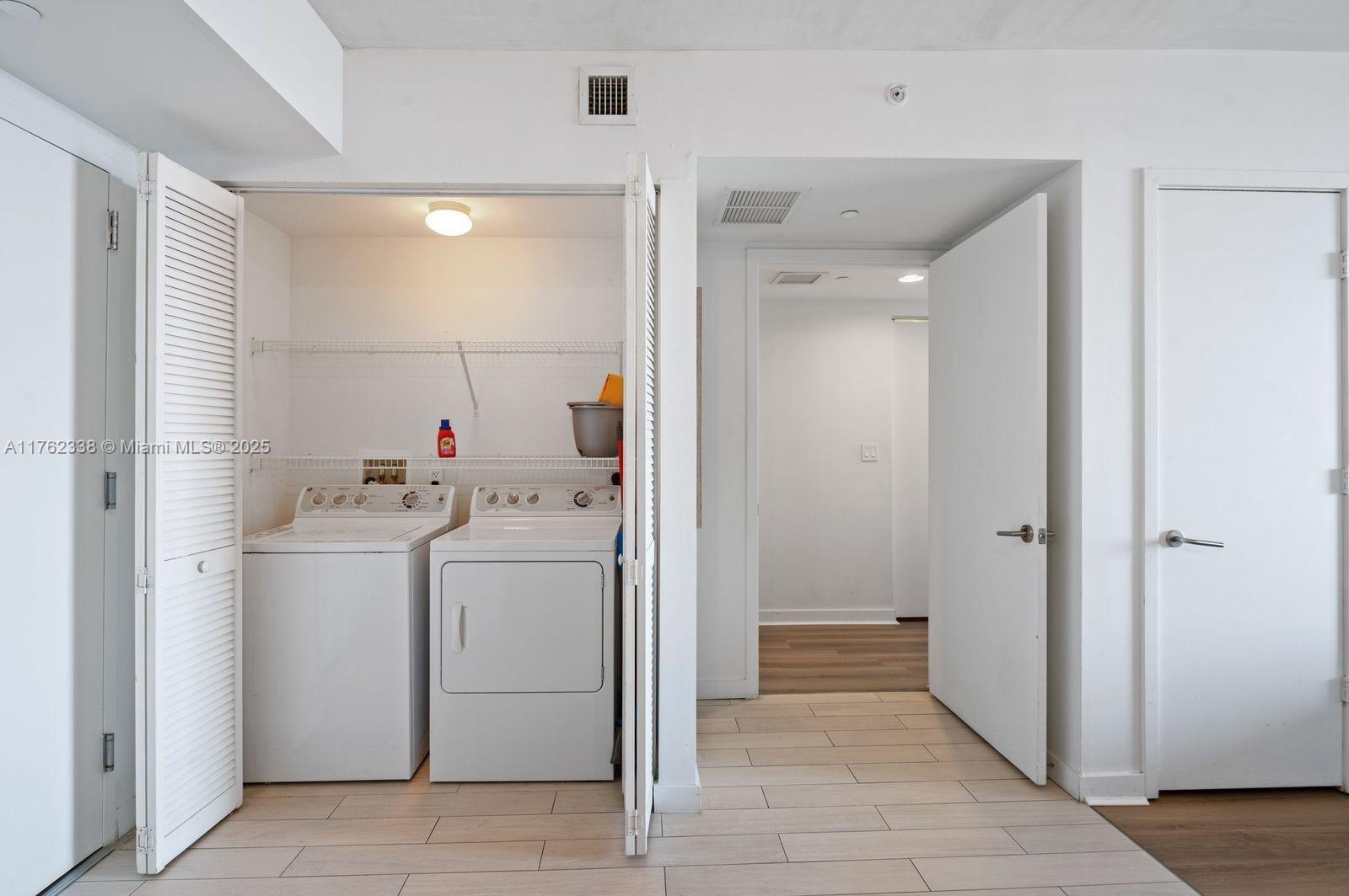 2602 East Hallandale Beach Boulevard, Unit R2703 Hallandale Beach, FL 33009 - Photo 43 of 50 a bathroom with a sink a toilet and shower