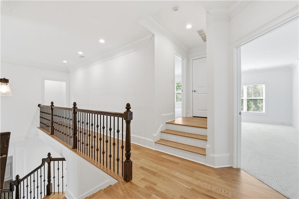 6740 Castleton Drive Northwest Sandy Springs, GA 30328 - Photo 25 of 58 a view of entryway and hall with wooden floor