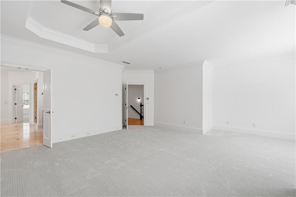 6740 Castleton Drive Northwest Sandy Springs, GA 30328 - Photo 27 of 58 wooden floor in an empty room