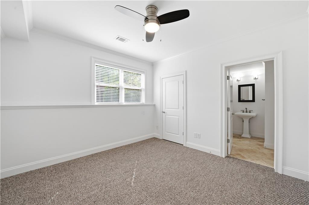 6740 Castleton Drive Northwest Sandy Springs, GA 30328 - Photo 36 of 58 a view of an empty room with a window