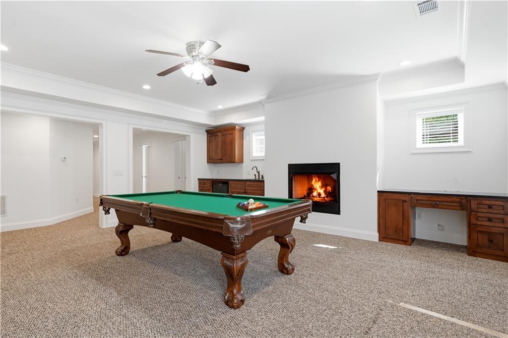 6740 Castleton Drive Northwest Sandy Springs, GA 30328 - Photo 39 of 58 a room with pool table and windows