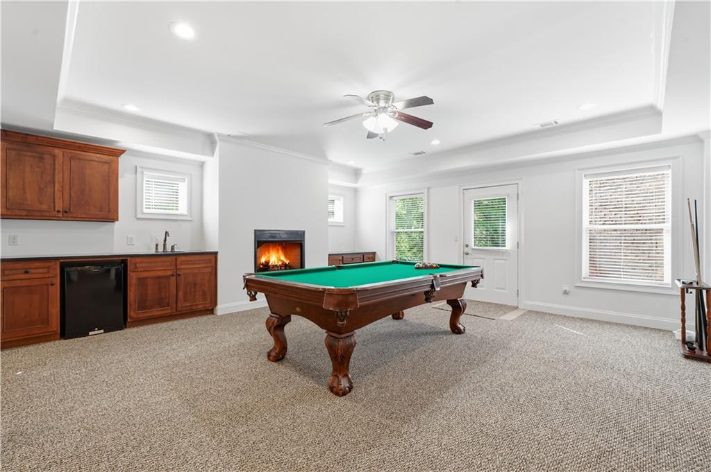 6740 Castleton Drive Northwest Sandy Springs, GA 30328 - Photo 40 of 58 a room with furniture pool table and window
