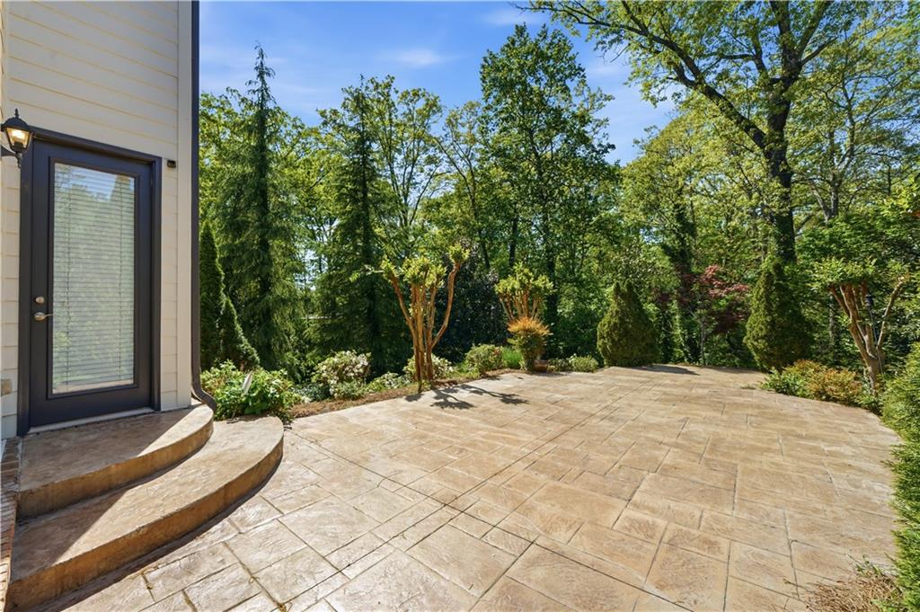 6740 Castleton Drive Northwest Sandy Springs, GA 30328 - Photo 43 of 58 a view of a backyard of a house