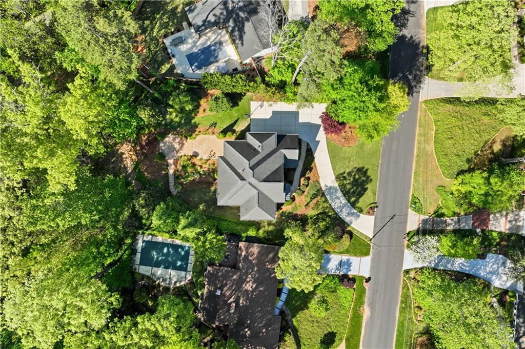 6740 Castleton Drive Northwest Sandy Springs, GA 30328 - Photo 47 of 58 an aerial view of residential house with outdoor space and trees all around