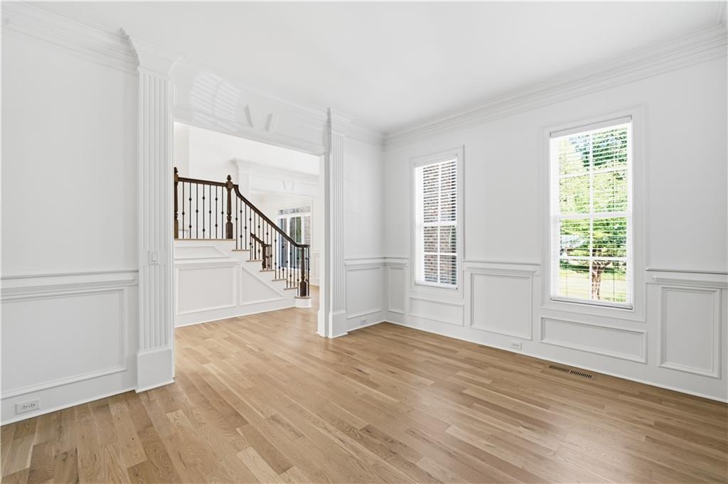 6740 Castleton Drive Northwest Sandy Springs, GA 30328 - Photo 8 of 58 a view of an entryway with wooden floor