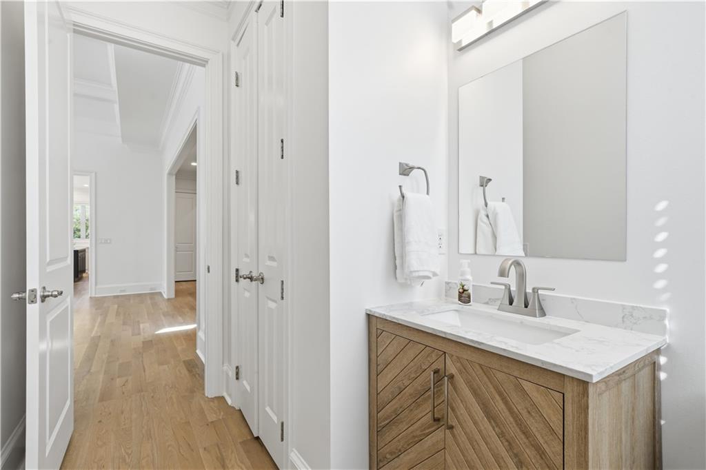 6740 Castleton Drive Northwest Sandy Springs, GA 30328 - Photo 9 of 58 a bathroom with a sink and a mirror