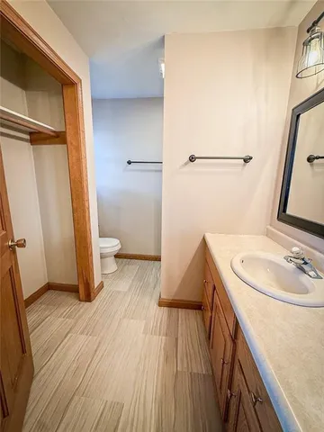 a bathroom with a sink and mirror
