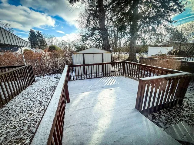a view of balcony with wooden floor