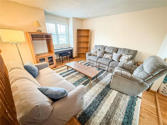 a living room with furniture and a couch