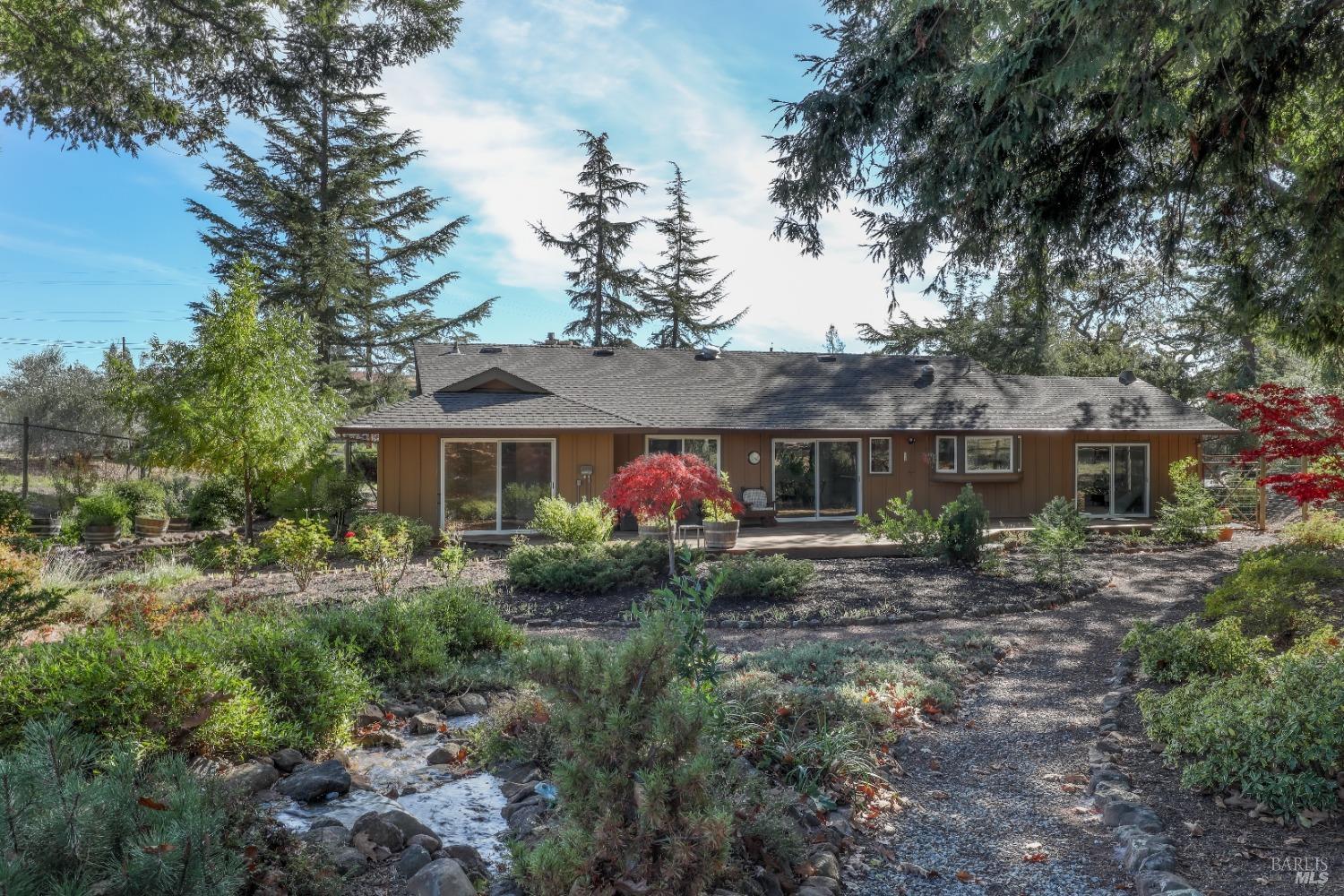 4271 Deer Trail Road Santa Rosa, CA 95404 - Photo 1 of 1 front view of a house with a yard
