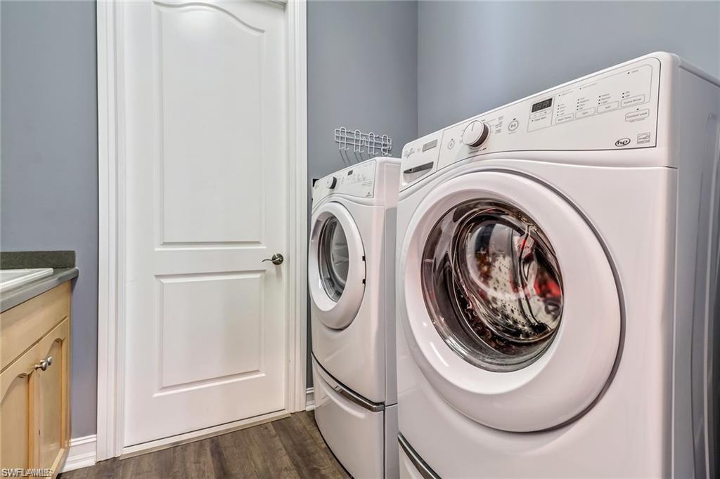 1374 Serrano Circle Naples, FL 34105 - Photo 17 of 37 a utility room with dryer and washer