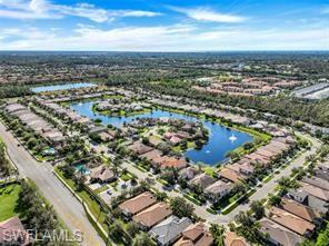 1374 Serrano Circle Naples, FL 34105 - Photo 23 of 37 an aerial view of residential houses with city view