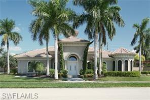 1374 Serrano Circle Naples, FL 34105 - Photo 26 of 37 a front view of a house with garden
