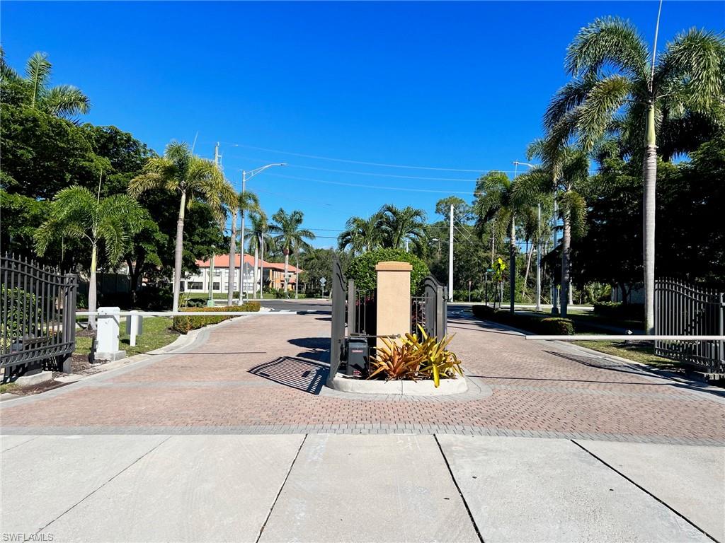 1374 Serrano Circle Naples, FL 34105 - Photo 27 of 37 a view of a park with swings and slides