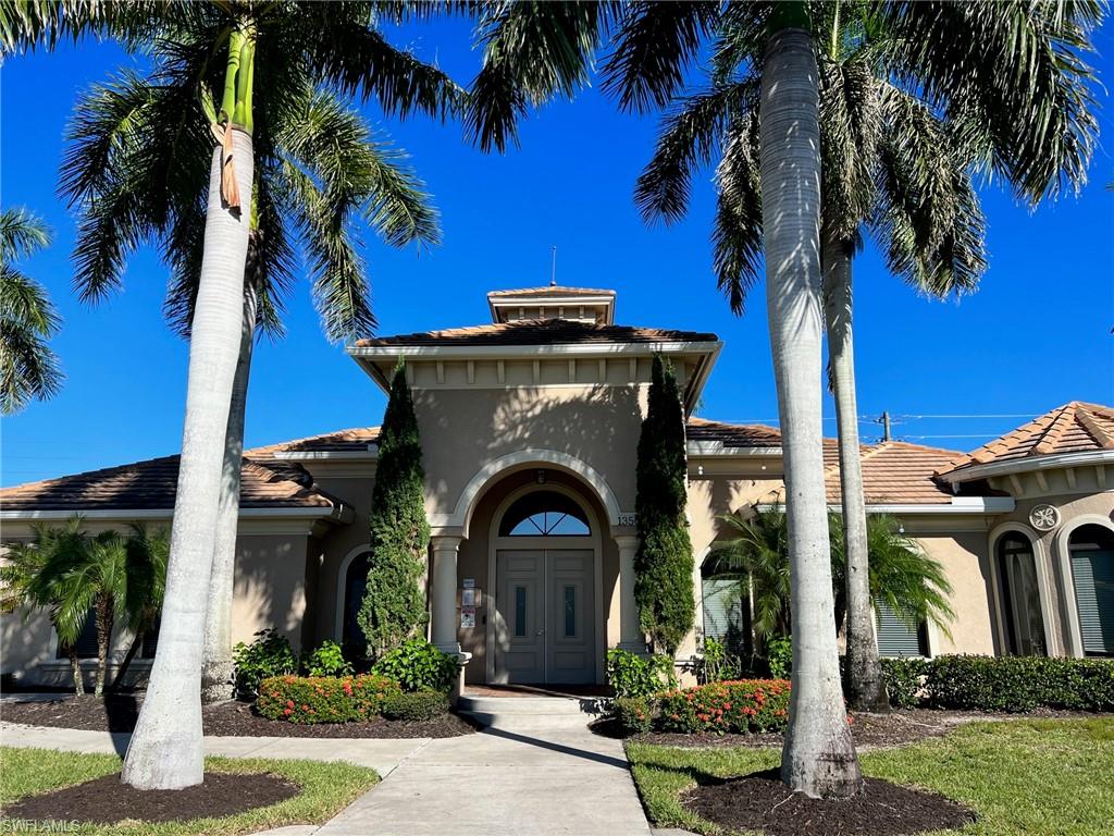 1374 Serrano Circle Naples, FL 34105 - Photo 28 of 37 a front view of a house with a garden