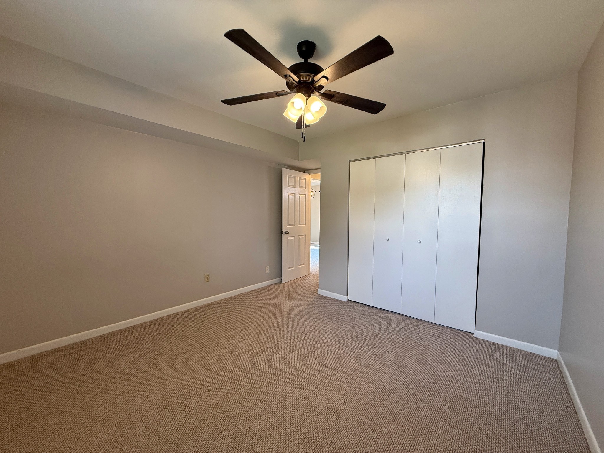 1702 Granville Road Franklin, TN 37064 - Photo 23 of 26 a view of an empty room with a ceiling fan