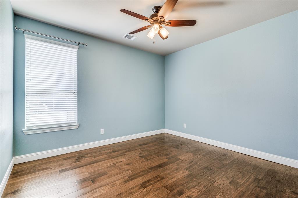 2143 Canyon Road Celina, TX 75009 - Photo 28 of 39 an empty room with a window and a fan