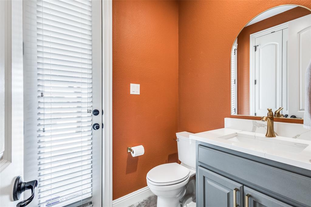 2143 Canyon Road Celina, TX 75009 - Photo 31 of 39 a bathroom with a sink and a toilet