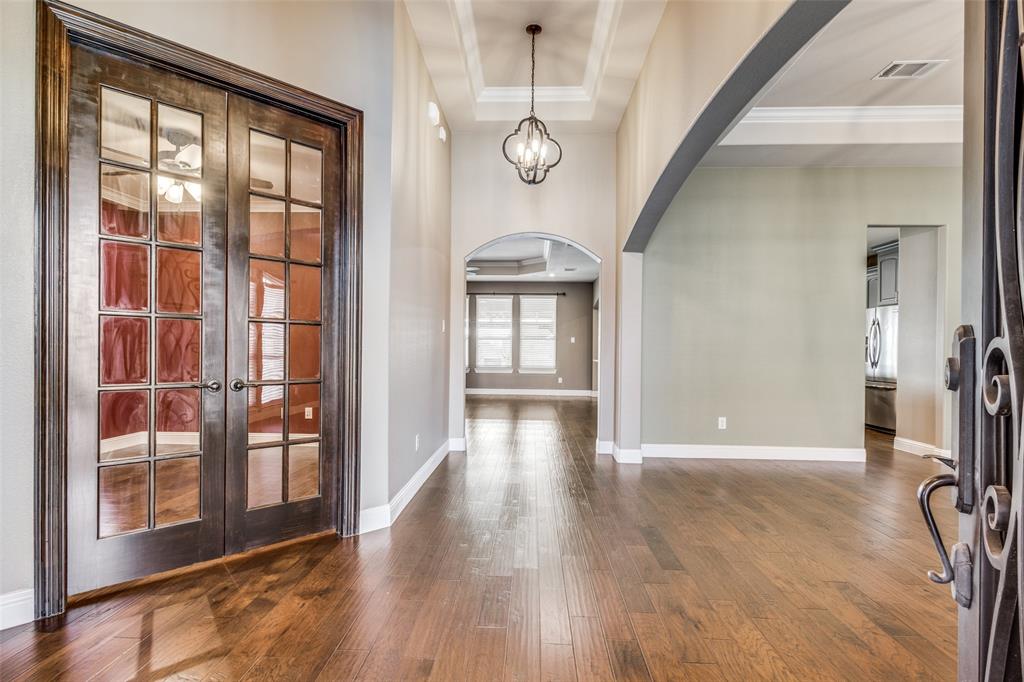 2143 Canyon Road Celina, TX 75009 - Photo 8 of 39 a view of an entryway with wooden floor