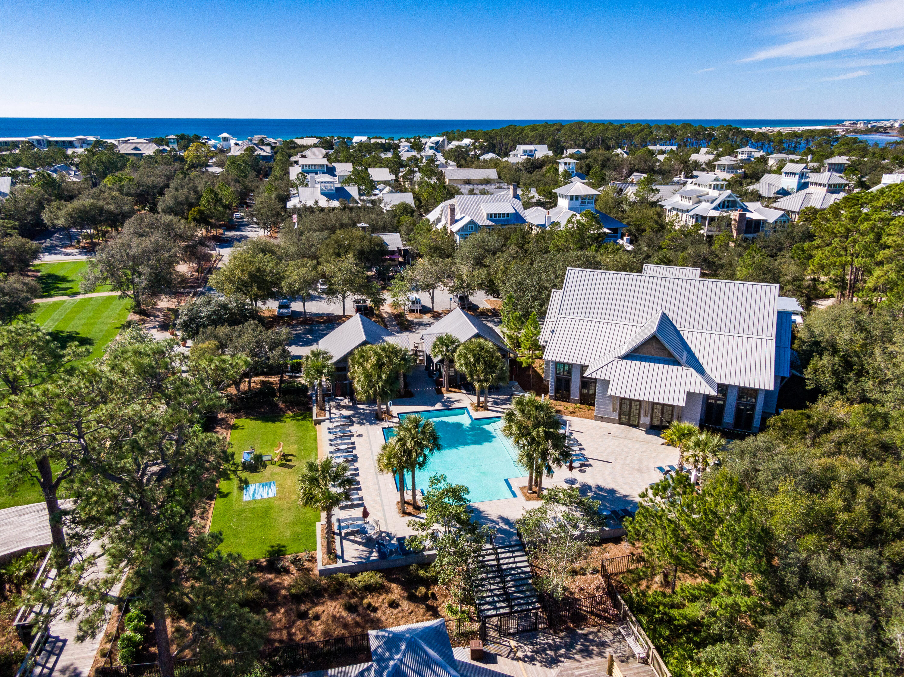 125 Silver Laurel Way Santa Rosa Beach, FL 32459 - Photo 57 of 64 an aerial view of residential houses with outdoor space and trees