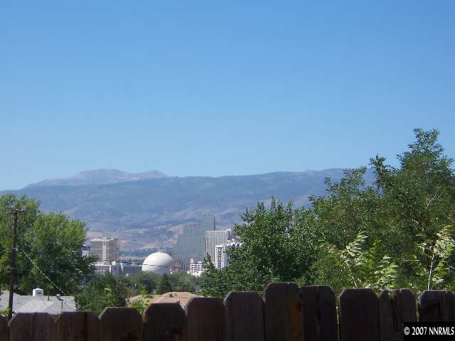45 Volmer Way Reno, NV 89512 - Photo 3 of 9 an aerial view of a house with mountain view