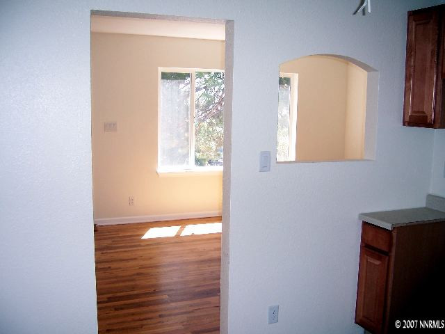 45 Volmer Way Reno, NV 89512 - Photo 4 of 9 a view of a living room that has a window
